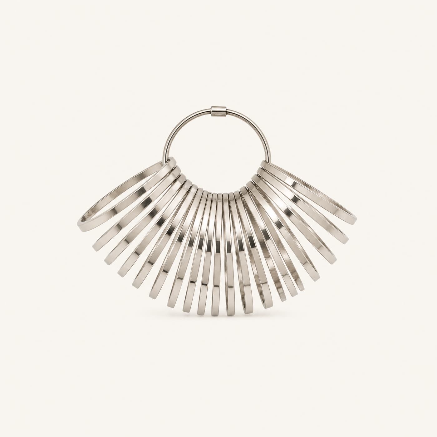 A fan of steel ring sizing bands on a keyring